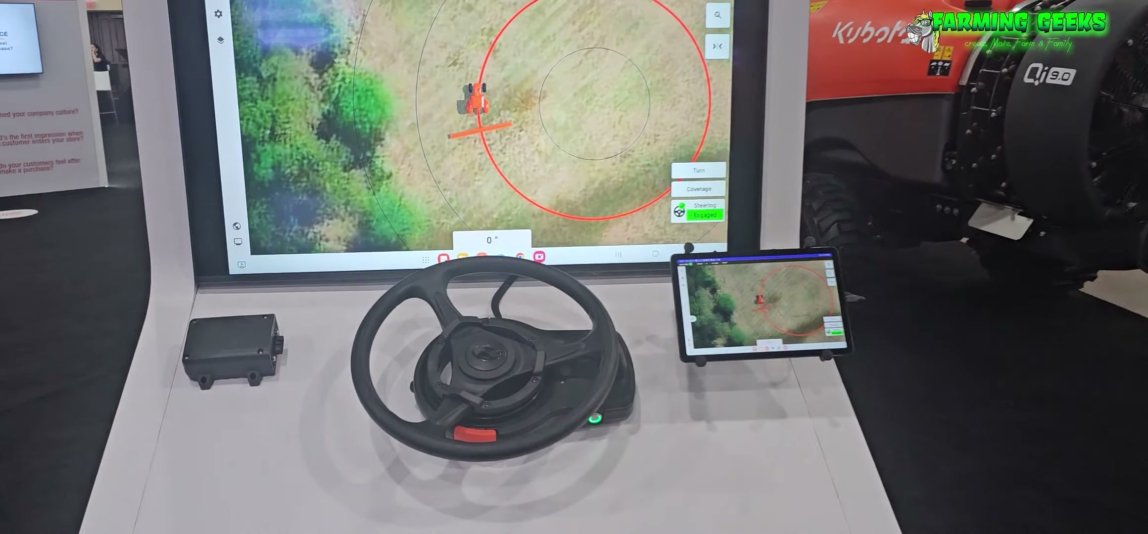 Kubota AutoSteer demo monitor, steering wheel, and tablet